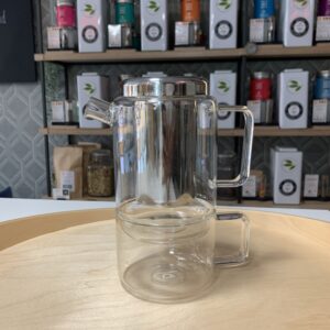 Ogo glazen theepot met filter en bijpassende glazen tas.